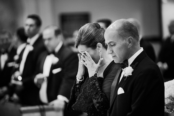 heartbreak black and white photo of parents crying during wedding ceremony - photo by New York based wedding photographers Maloman Photographers